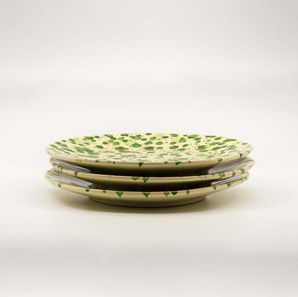 Ceramic dinner plate with irregular circumference. Handmade & hand painted spots a typical tuscan decoration.