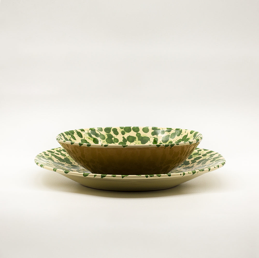 Ceramic dinner plate with irregular circumference. Handmade & hand painted spots a typical tuscan decoration.