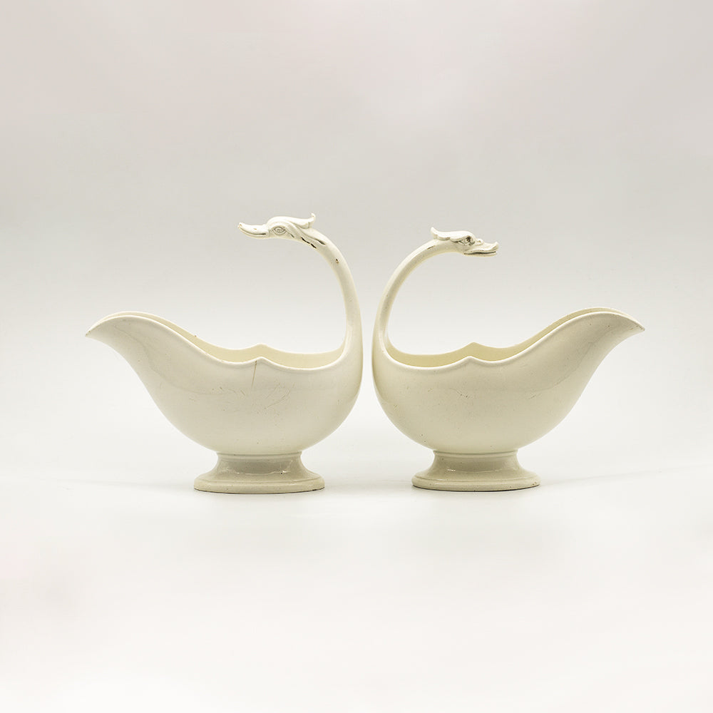 Pair of swan gravy bowls, 19th century
