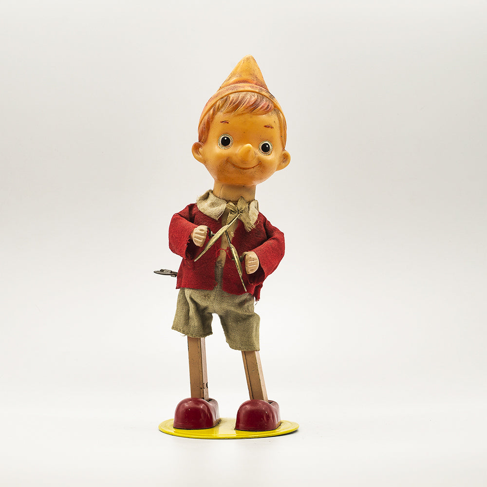 Truly Italian original Pinocchio toy, mechanic in rubber and metal.